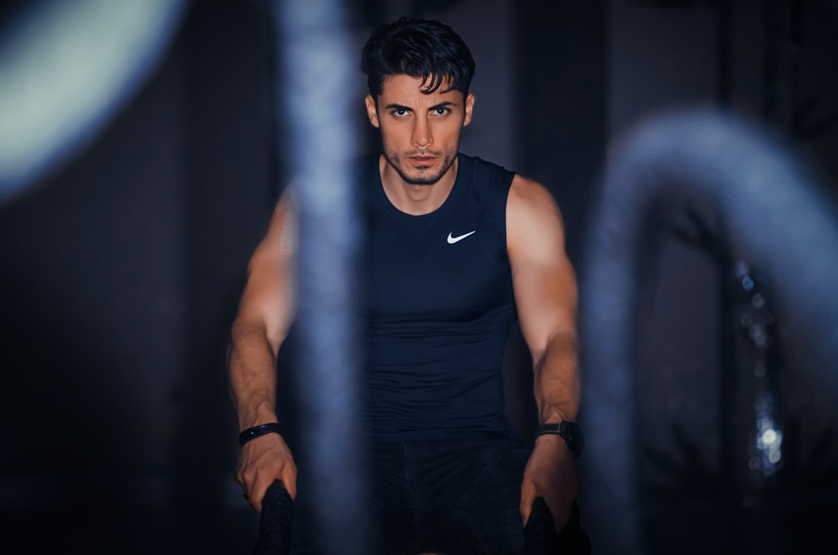 Male athlete demonstrating proper nutrition and stamina training